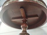 a wooden table with a wooden cross on top of it