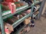 many boxes and boxes of assorted items on the shelves