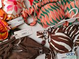 many different types of bikinis on display on the table