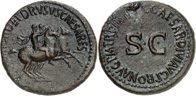 a close up of a coin with a horse and rider on it