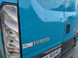 a close up of the back end of a blue truck