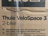 a cardboard box with the words thule velospace 3 on it