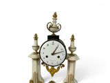 a clock that is sitting on top of a table
