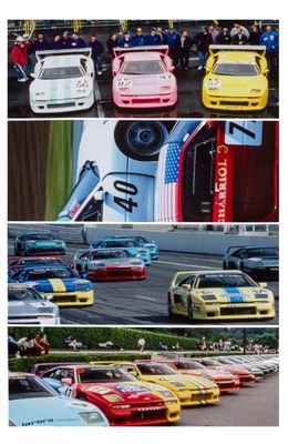 many different colored cars lined up in a row
