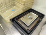 a tray with a lid sitting on top of a metal counter