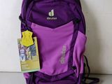 a purple backpack with a yellow tag on it
