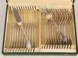 many forks and spoons in a box with a knife and fork