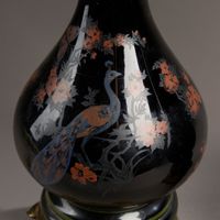 Paire de lampes à pétrole en céramique émaillée noir à décor… (photo 2)