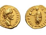 a gold coin with an image of a man and a woman on it