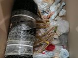a cardboard box filled with many different types of items