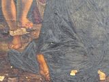 a picture of a painting of a woman kneeling on the ground