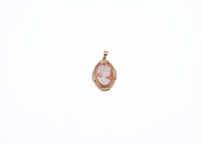 a pink and gold pendant with a picture of a woman in a dress