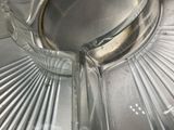a close up view of a glass bowl with a lid