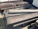 many pieces of wood that are stacked on top of each other