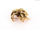 an image of a close up of a brooch with a palm tree on it