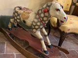 a rocking horse that is sitting on the floor