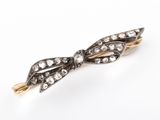 an antique diamond and gold broochle broochle