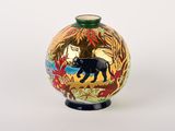 a small vase with a picture of a bear on it