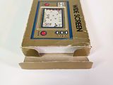 a box with a clock inside of it on a table
