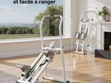 an image of a home gym equipment set up in a living room