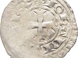 a close up of a coin on a white background