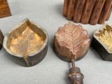 a lot of different types of decorative objects on the table