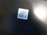 a small intel logo on the back of a laptop