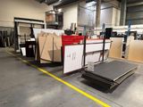 a large warehouse with a lot of different types of furniture