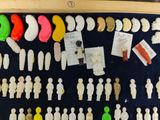 a picture of a display case with a lot of small figurines and magnets