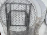 two chairs that have been wrapped in plastic to look like they are sitting next to each other