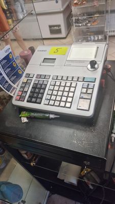 a calculator sitting on top of a table in a store