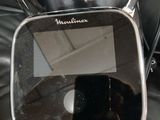 a blender that is sitting on top of a black chair