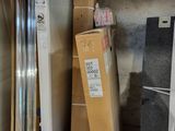 a lot of boxes that are stacked up on the floor