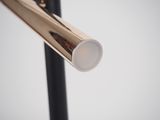 a close up of a baseball bat with a white cap on it
