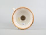 an image of a close up of a cup on a white surface