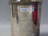 a silver cup with a sticker on it