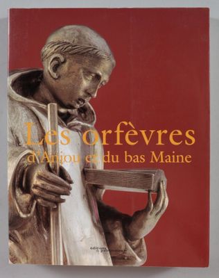la couverture d'un livre sur laquelle figure la statue d'un homme tenant un livre