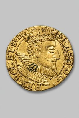 an image of a gold coin with a woman ' s face on it