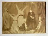 an old photo of a group of people posing for a picture