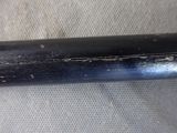 a close up of a baseball bat on a table