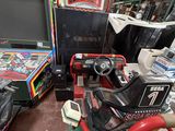 a lot of video games and other games in a room