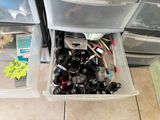 a plastic container filled with lots of different items