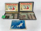 two boxes of meccano and a box of meccano