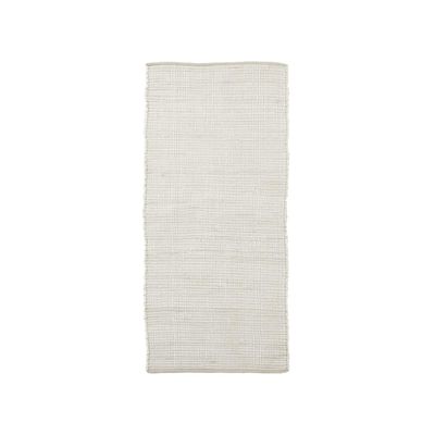 a white rug on a white background
