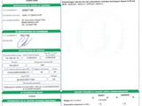 a green and white id card with a picture of a man in a suit