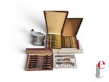 a wooden box filled with different types of tools