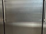 three stainless steel refrigerators in a kitchen next to each other