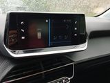 a car dashboard with a digital display on it