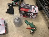 many tools that are sitting on the floor next to each other