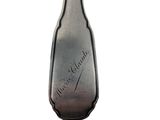 a silver spoon with a silver handle on a white background
